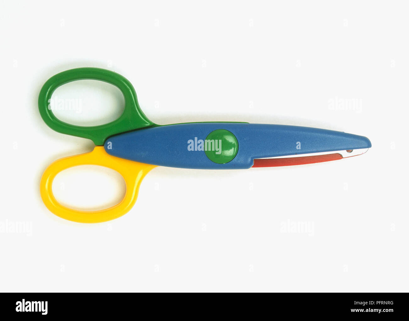 Multi-coloured pair of scissors Stock Photo