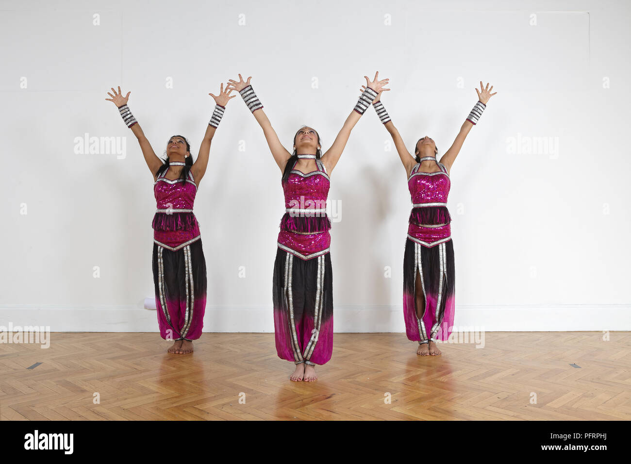 Teenage girls performing Bollywood dance moves (formation Stock Photo -  Alamy