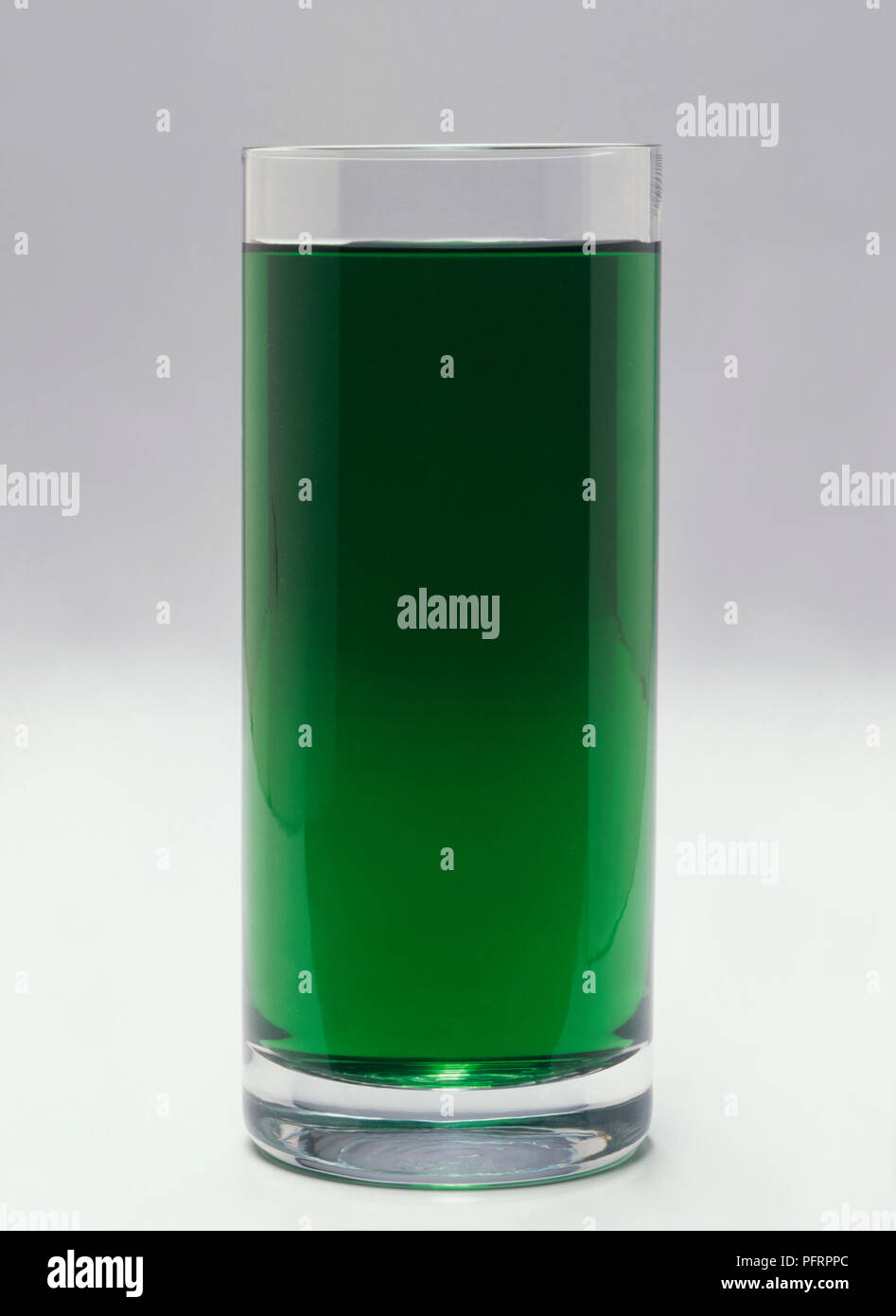Green cordial in tall glass Stock Photo Alamy