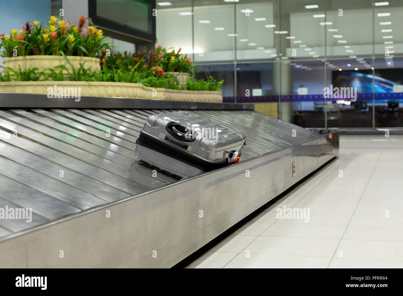 Luggage claim on conveyor belt Stock Photo Alamy