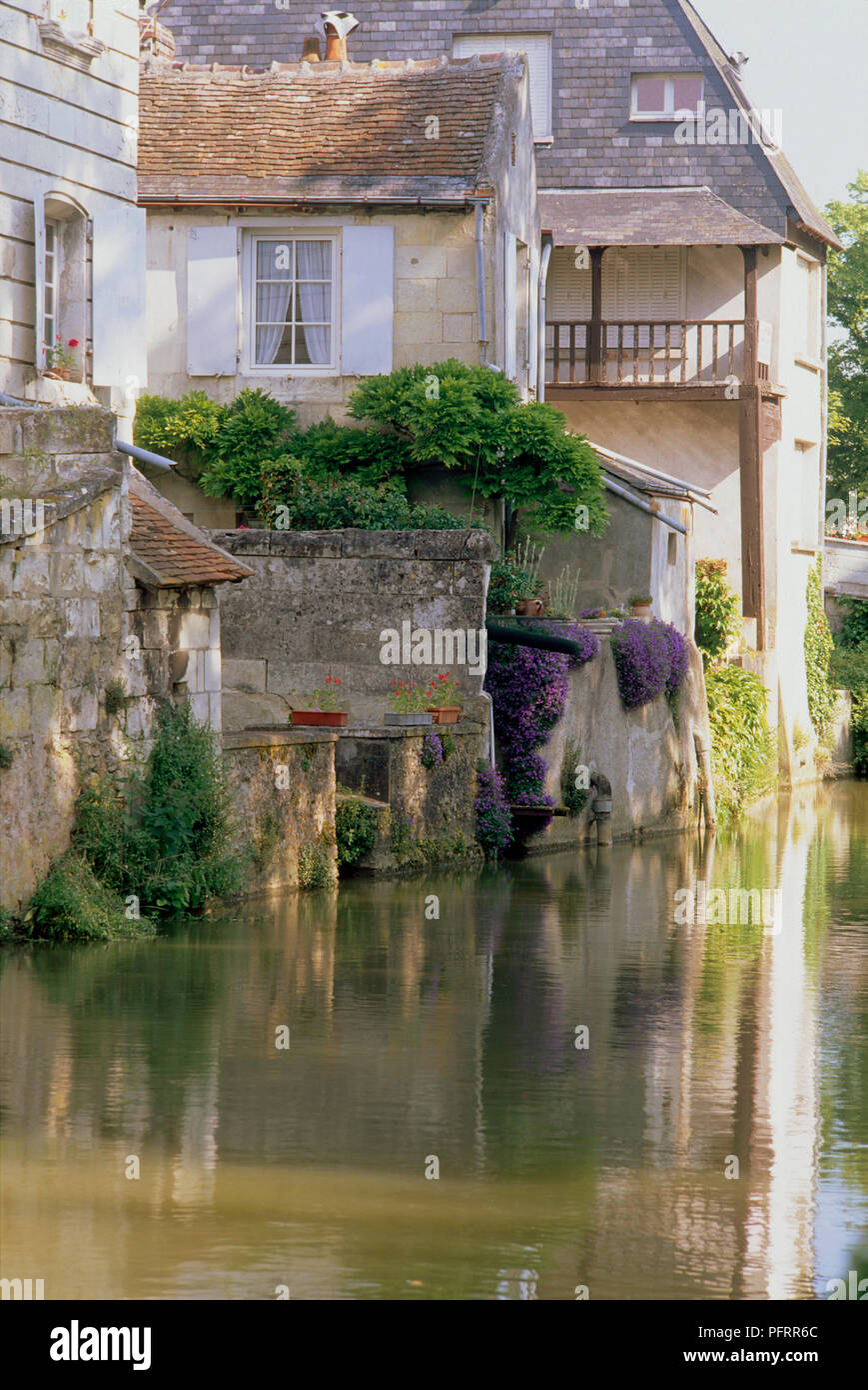 France, Loire Valley, old houses built above canal Stock Photo Alamy