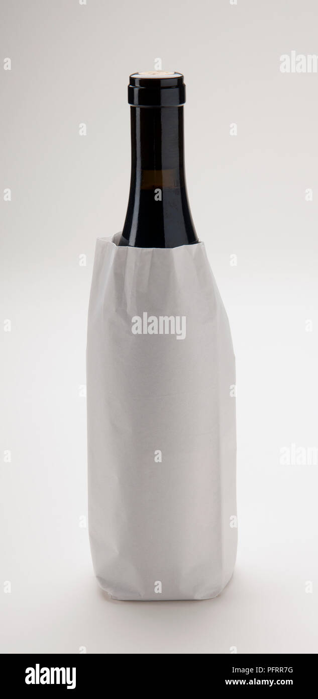 Download Bottle Of Wine Wrapped In Paper Stock Photo Alamy Yellowimages Mockups