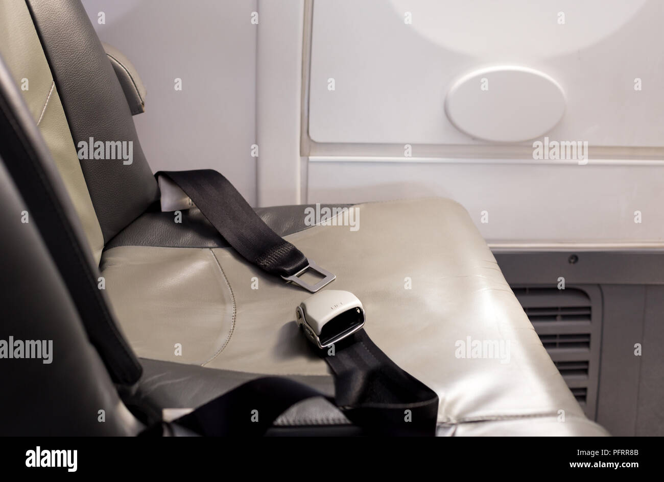 Safety Concept seat belt on a airplane Stock Photo Alamy