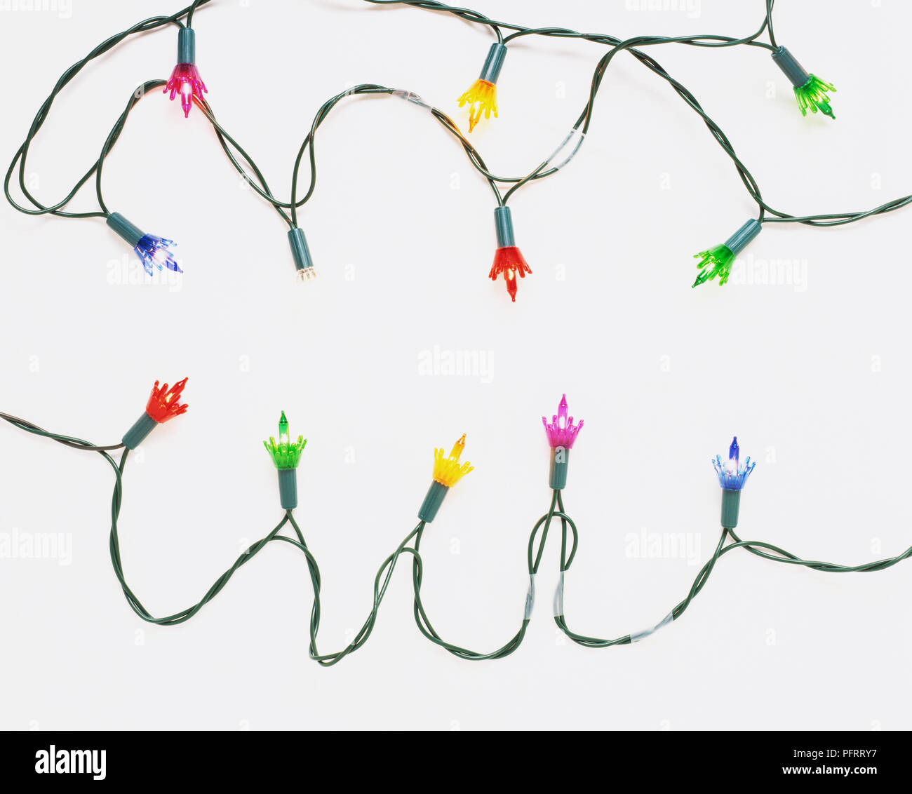 Two rows of illuminated fairy lights Stock Photo - Alamy