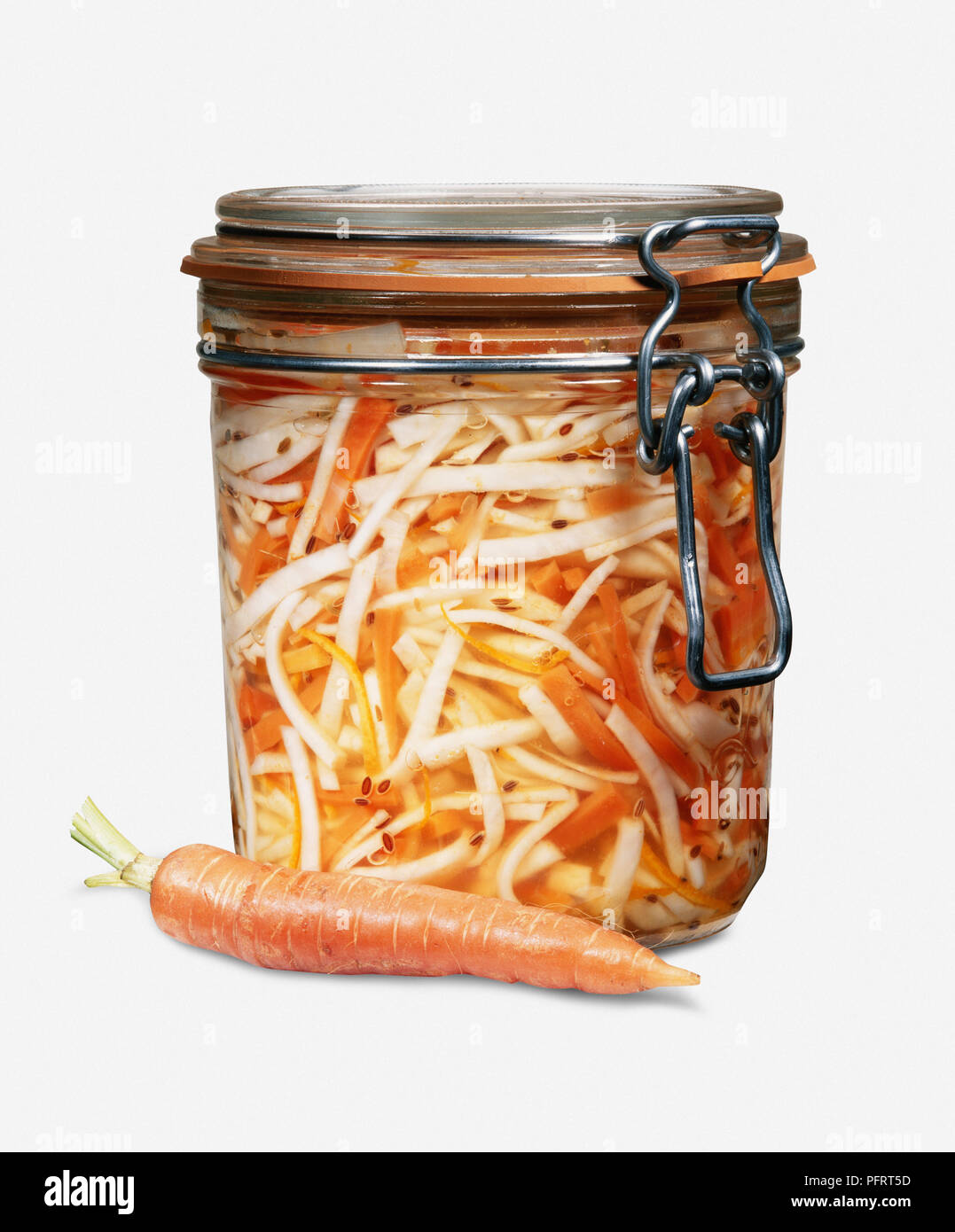 Jar of pickled celeriac and carrot salad Stock Photo