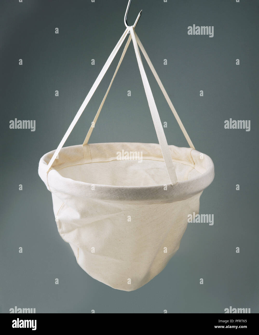 Jelly bag, bowlshaped porous bag held by four ribbons Stock Photo Alamy