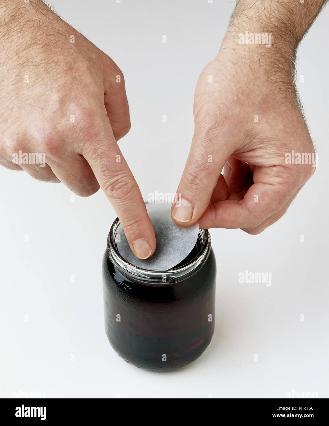 Download Jelly Jar Being Sealed With Wax Disc Stock Photo Alamy Yellowimages Mockups