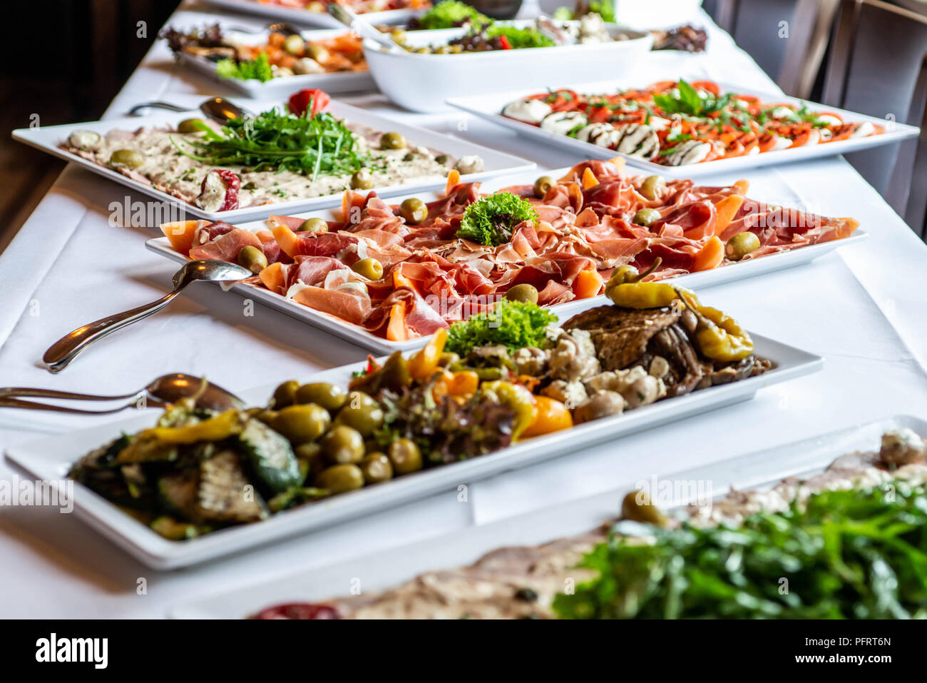 Party Brunch big Buffet table setting with Food Meat Vegetables Stock