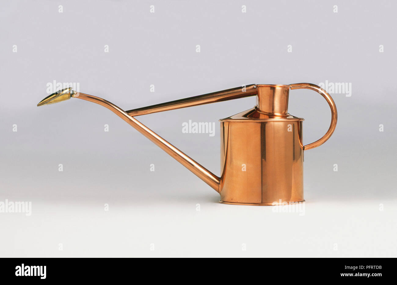 Copper watering can Stock Photo Alamy