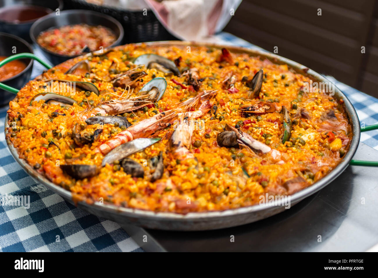 huge Paella pan plate with seafood and rice traditional Spanish food Stock Photo Alamy