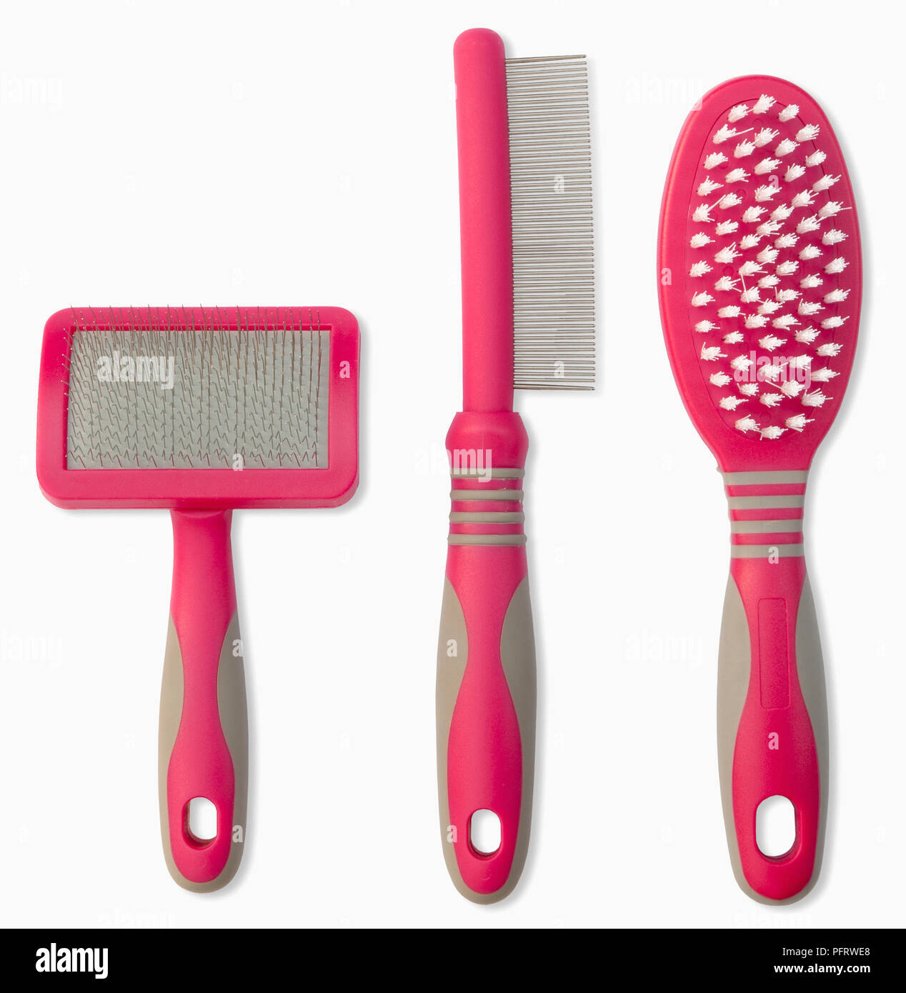 Slicker brush, fine comb and soft bristles brush for pets Stock Photo