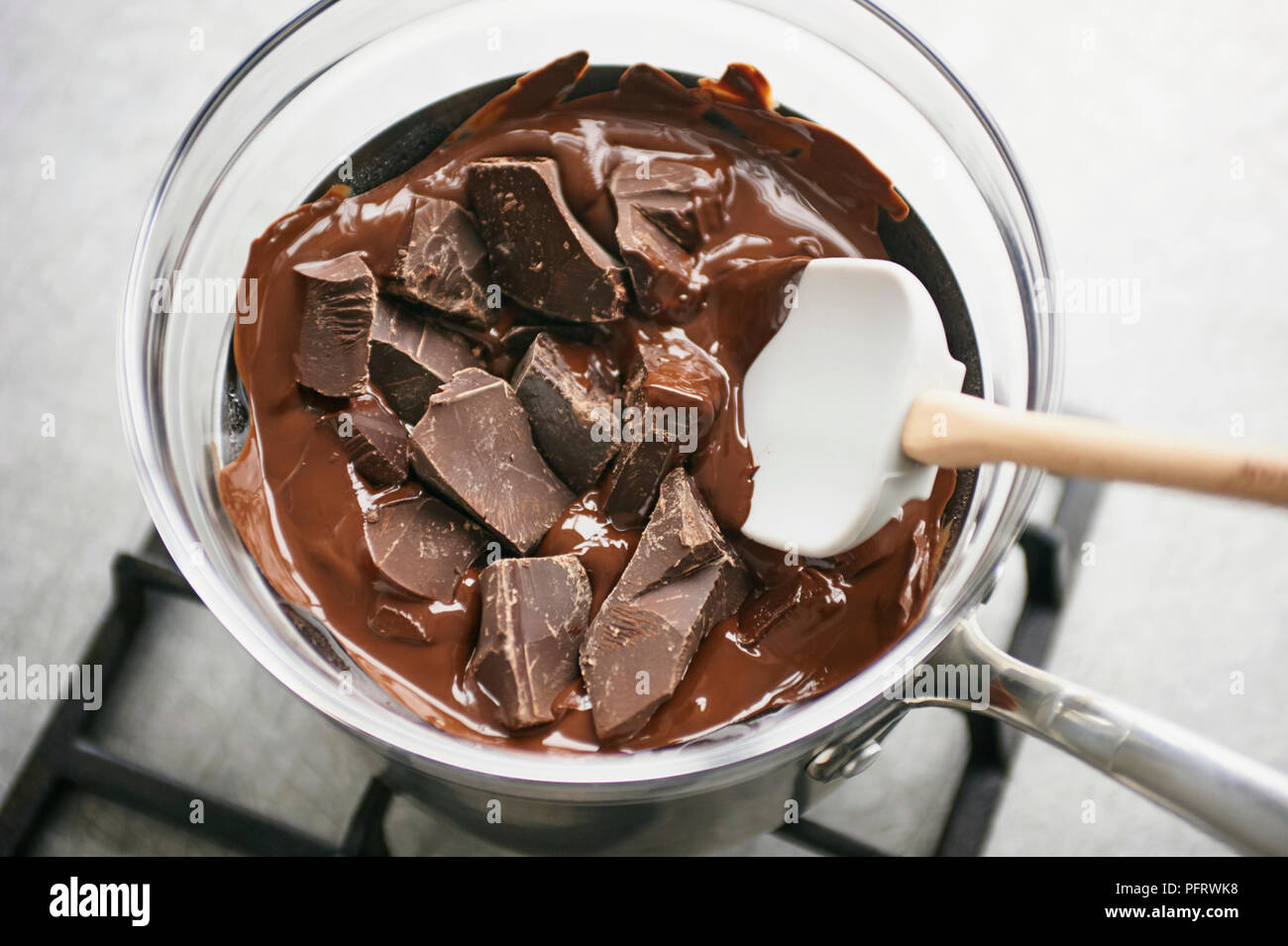 Tempering chocolate Stock Photo