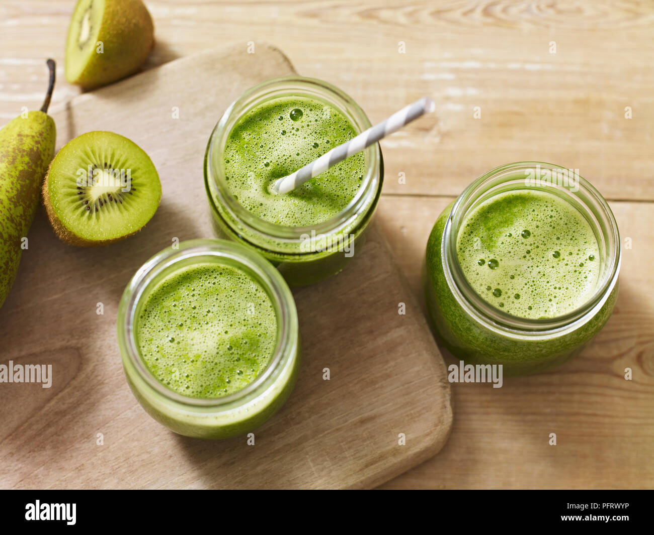Kiwi and pear juice Stock Photo Alamy