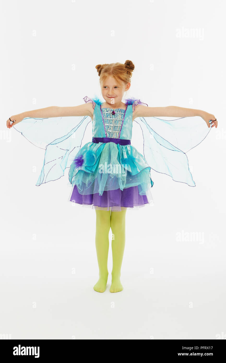 Young girl in blue and green fairy costume Stock Photo