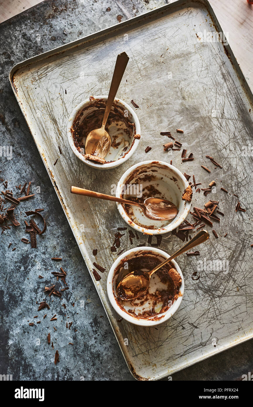 Chocolate souffles with peanut gianduja, eaten Stock Photo