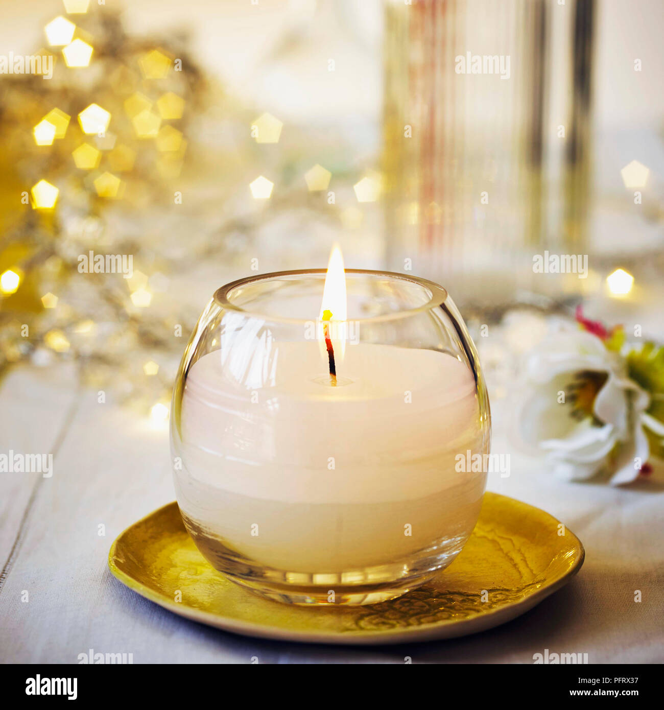 Uplifting candle Stock Photo