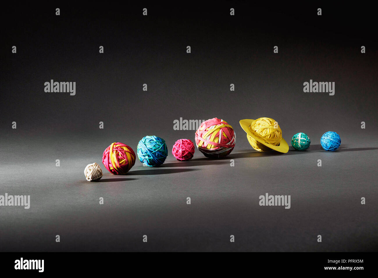 Steo by step rubber band planets, mercury, venus, earth, mars, jupiter, saturn, uranus, netune, Stock Photo
