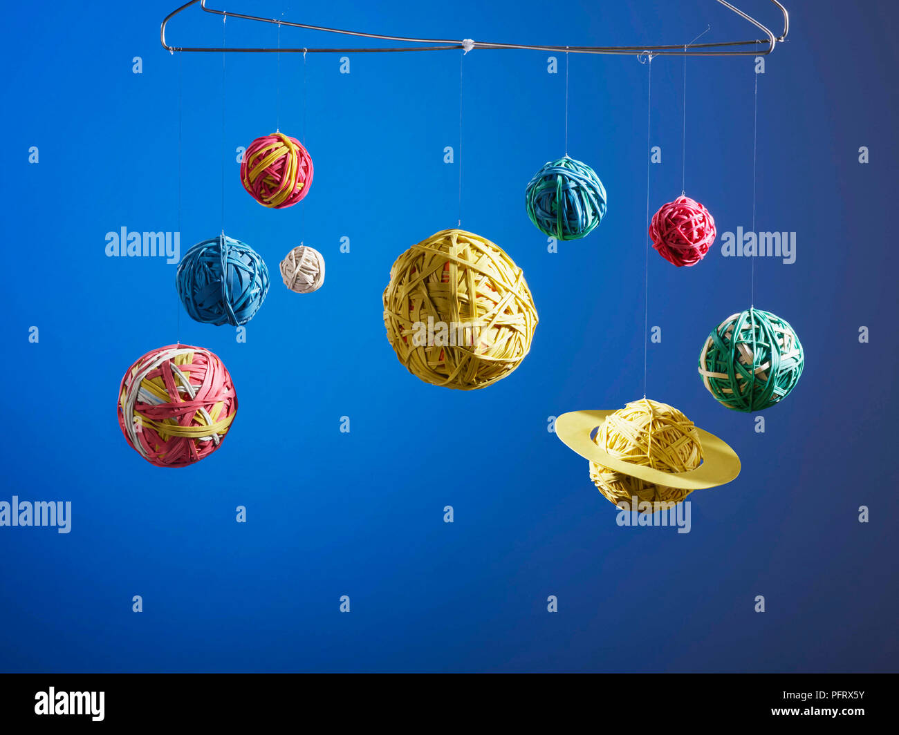 Rubber band planets Stock Photo