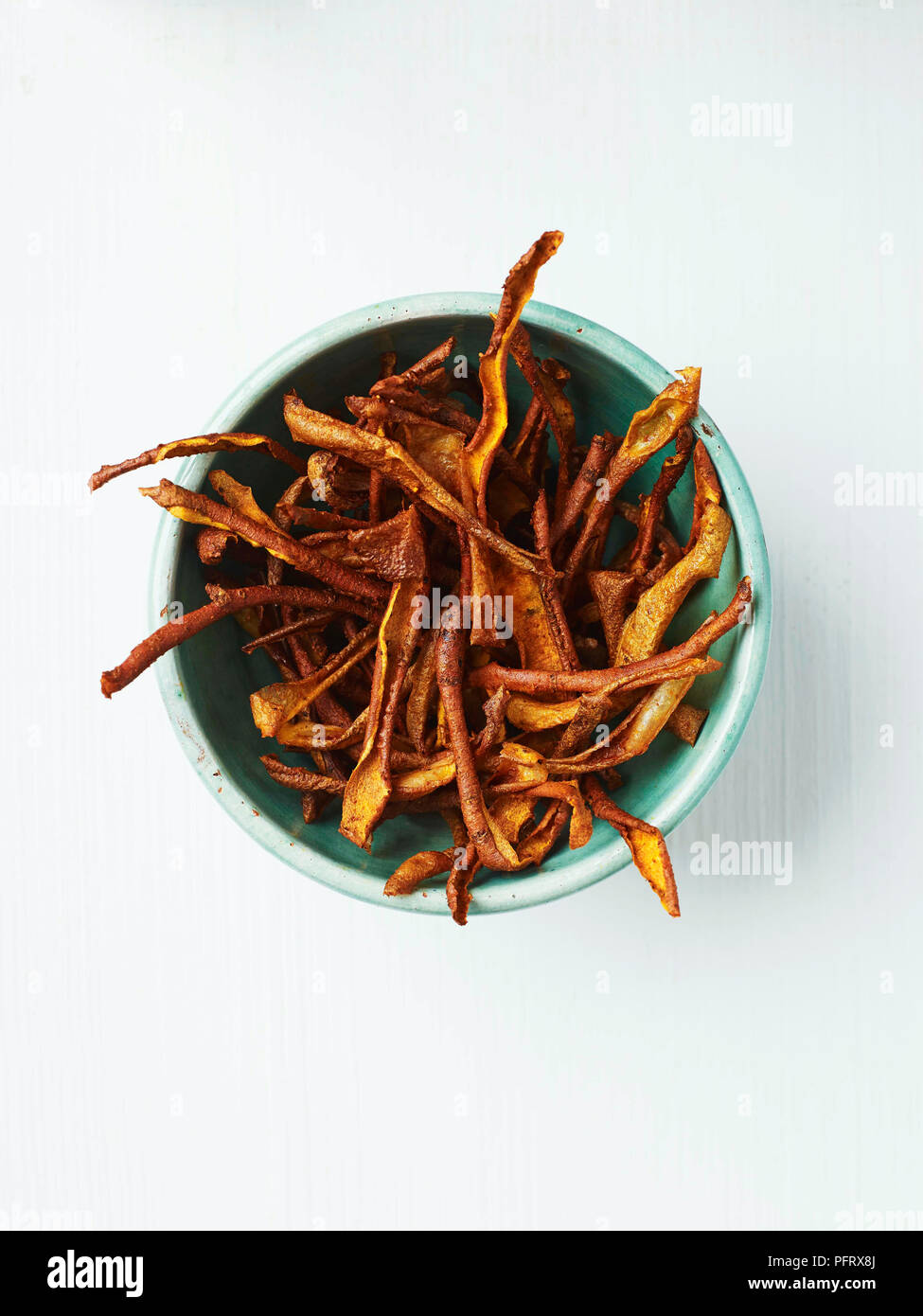 Sweet potato peel vegetable crisps in a bowl Stock Photo Alamy
