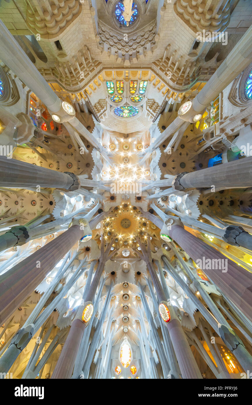 Barcelona, Spain - March 27, 2018: Ceiling and columns of the Basilica i Temple Expiatori de la Sagrada Familia (Basilica and Expiatory Church of the  Stock Photo