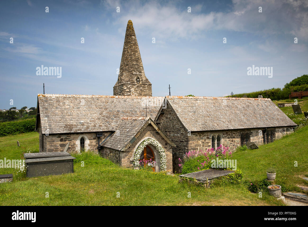 UK, Cornwall, Trebetherick, Daymer Bay, Saint Enodoc’s Church amongst golf links Stock Photo
