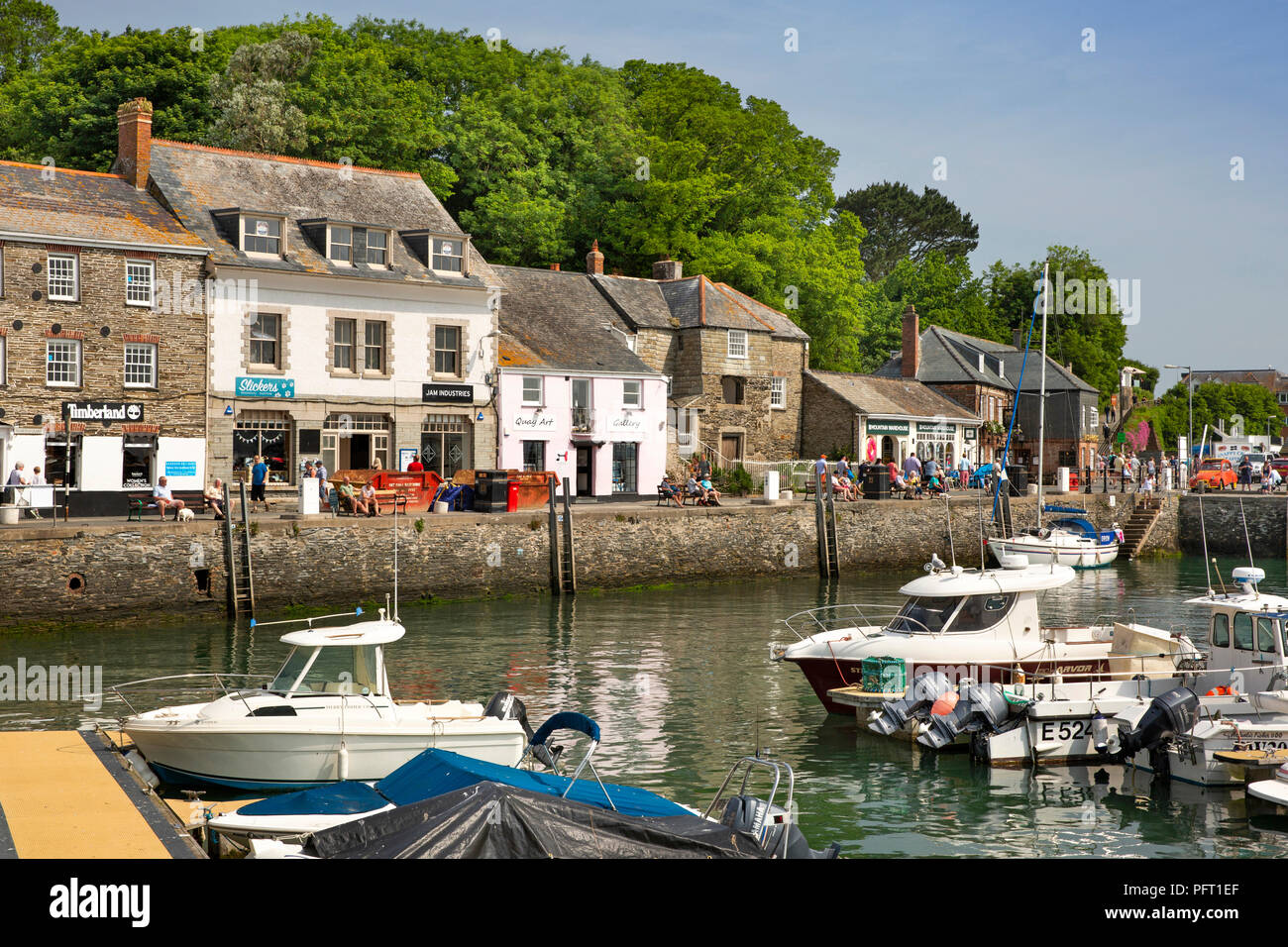 UK, Cornwall, Padstow, boats moored in inner harbout n front of North Quay Stock Photo