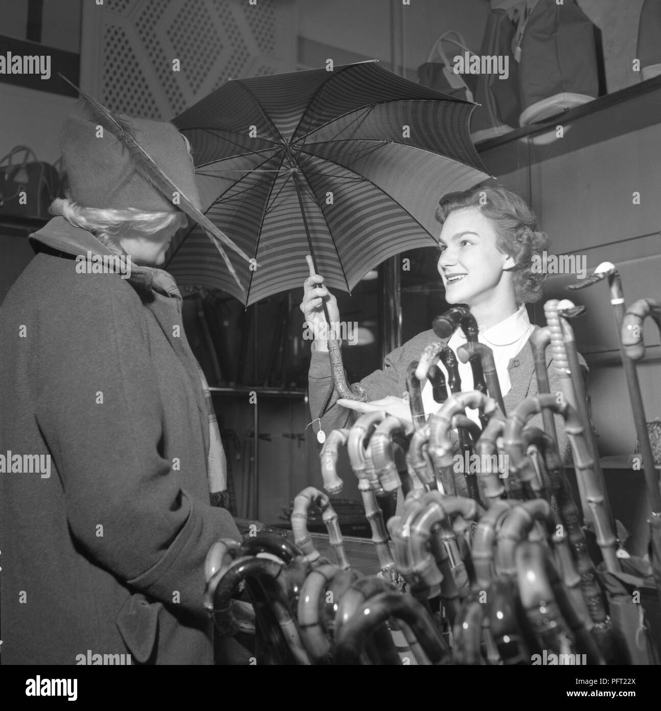 Women Umbrellas Black and White Stock Photos & Images - Alamy