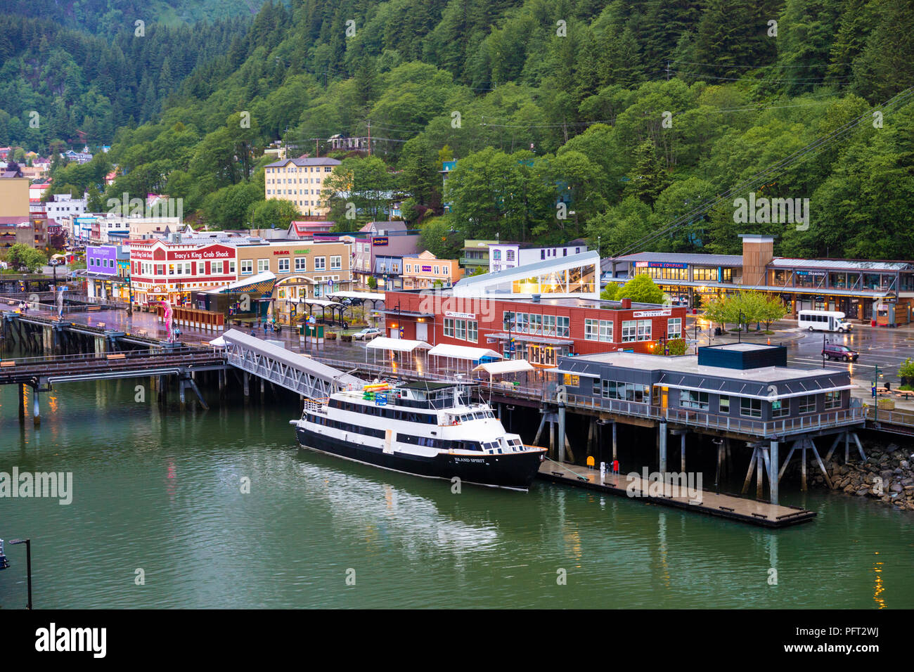 Dusk falling on the harbour front on a rather wet day in Juneau, the capital city of Alaska, USA Stock Photo