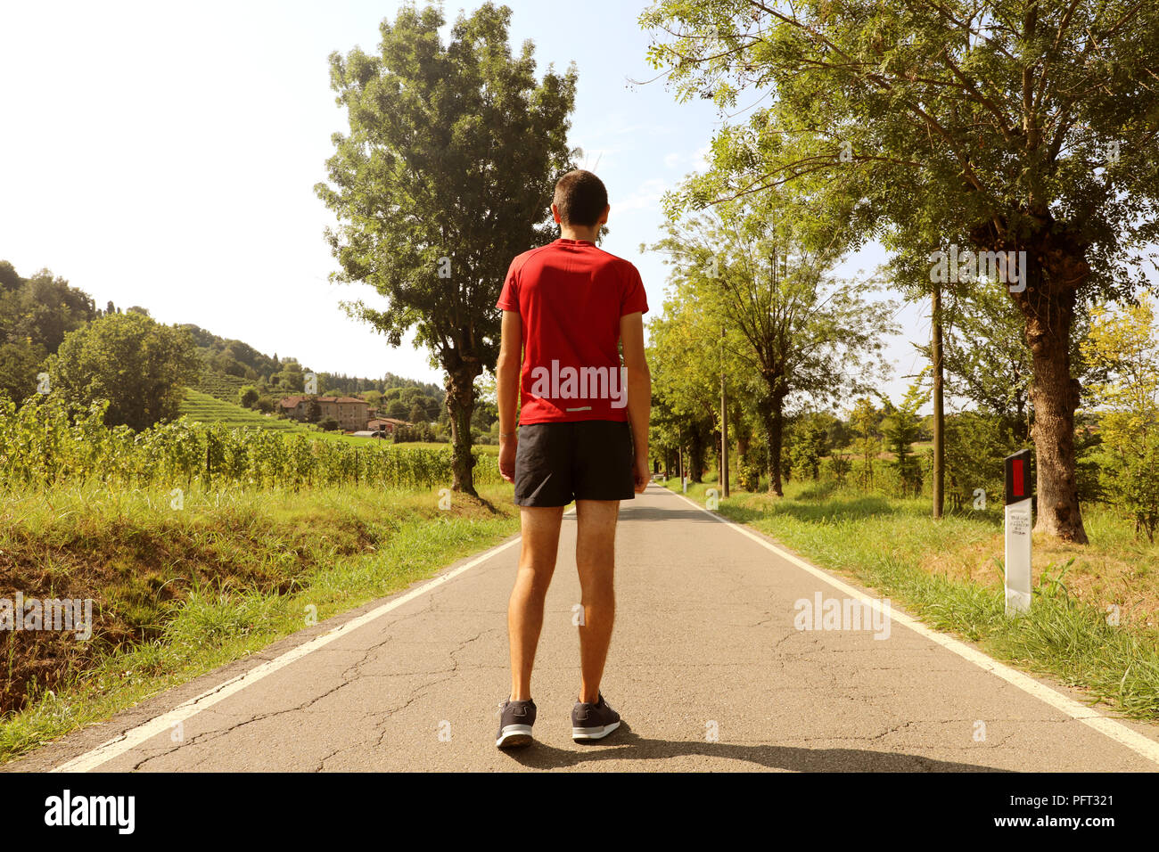 Back view man start running outdoor Stock Photo Alamy