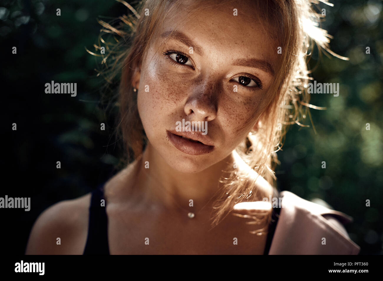 portrait of cute beautiful young girl with freckles close-up Stock Photo -  Alamy