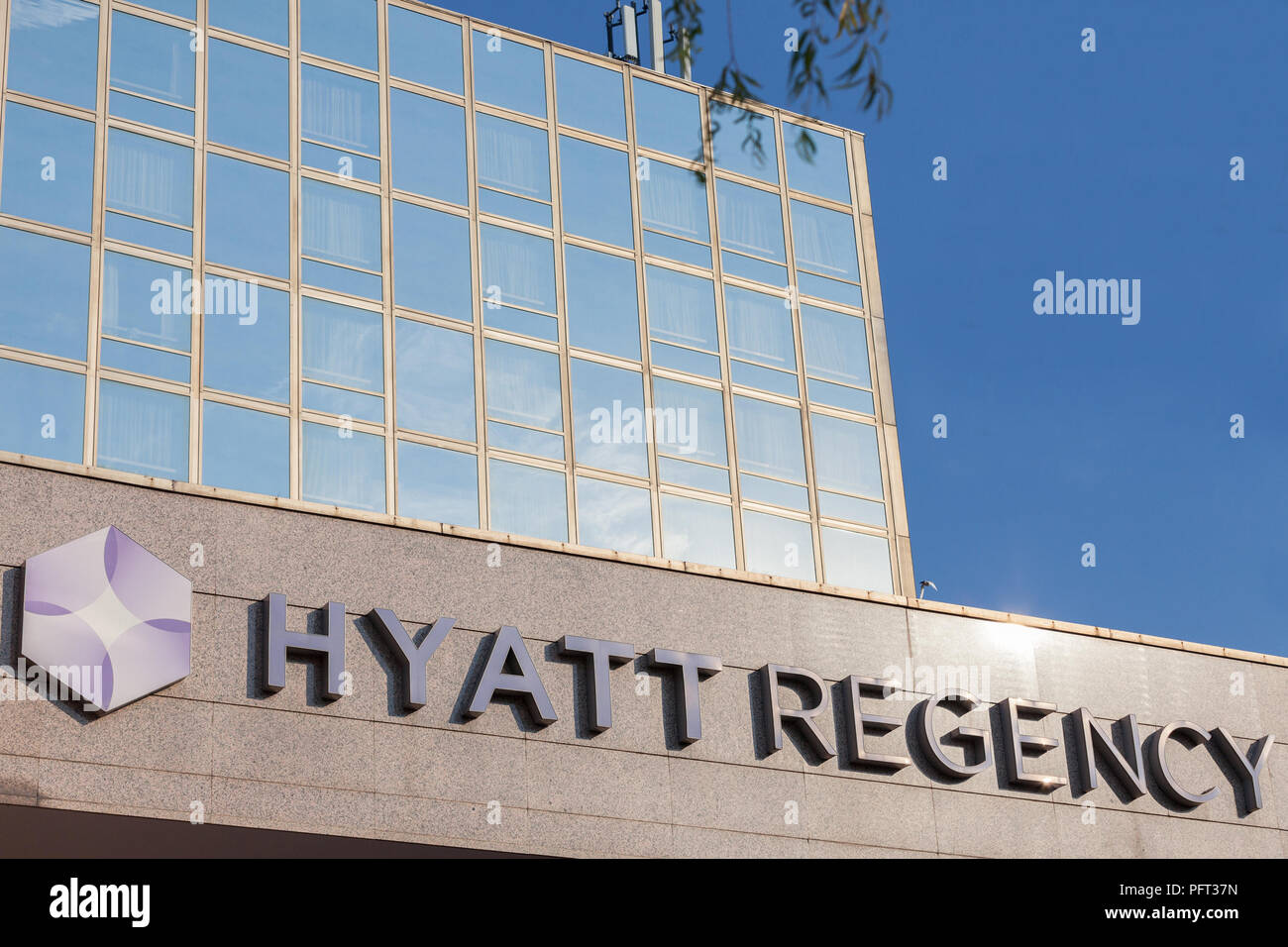 BELGRADE, SERBIA - AUGUST 21, 2018: Hyatt Regency logo on their main hotel in Serbia. Hyatt Hotels Corporation is a worldwide brand, owner and franchi Stock Photo