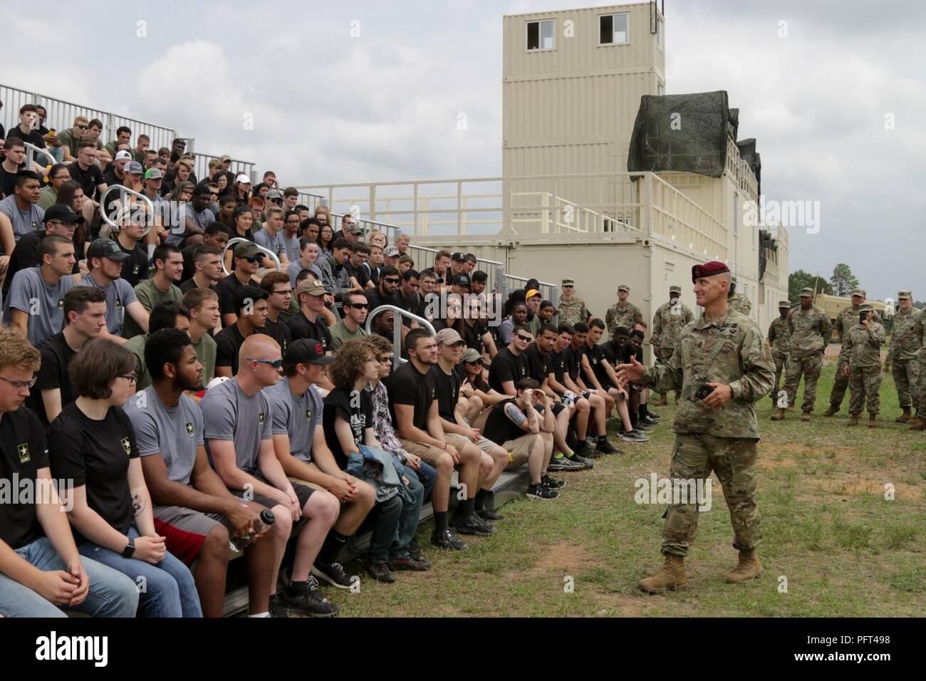 Command Sgt. Maj. Michael A. Ferrusi, the 82nd Airborne Division senior enlisted advisor, talks to future Soldiers after the division’s Airborne Review at Sicily Drop Zone on Fort Bragg, North Carolina, May 24, 2018. Ferrusi described the role of the American Soldier to 350 future Soldiers and recruiters from Raleigh Recruiting Battalion. Stock Photo