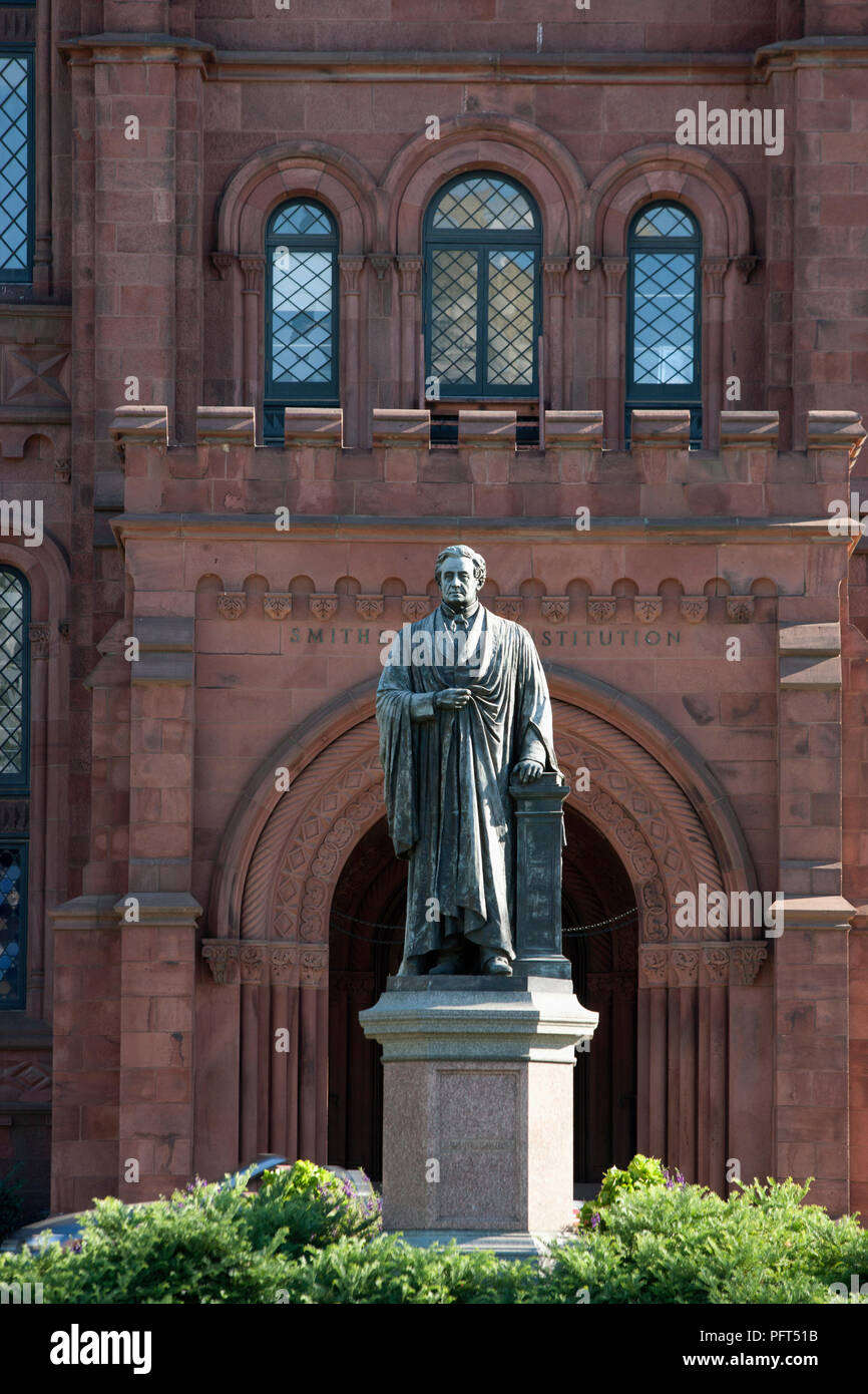 USA, Washington DC, The Smithsonian Castle, statue of Joseph Henry outside entrance Stock Photo