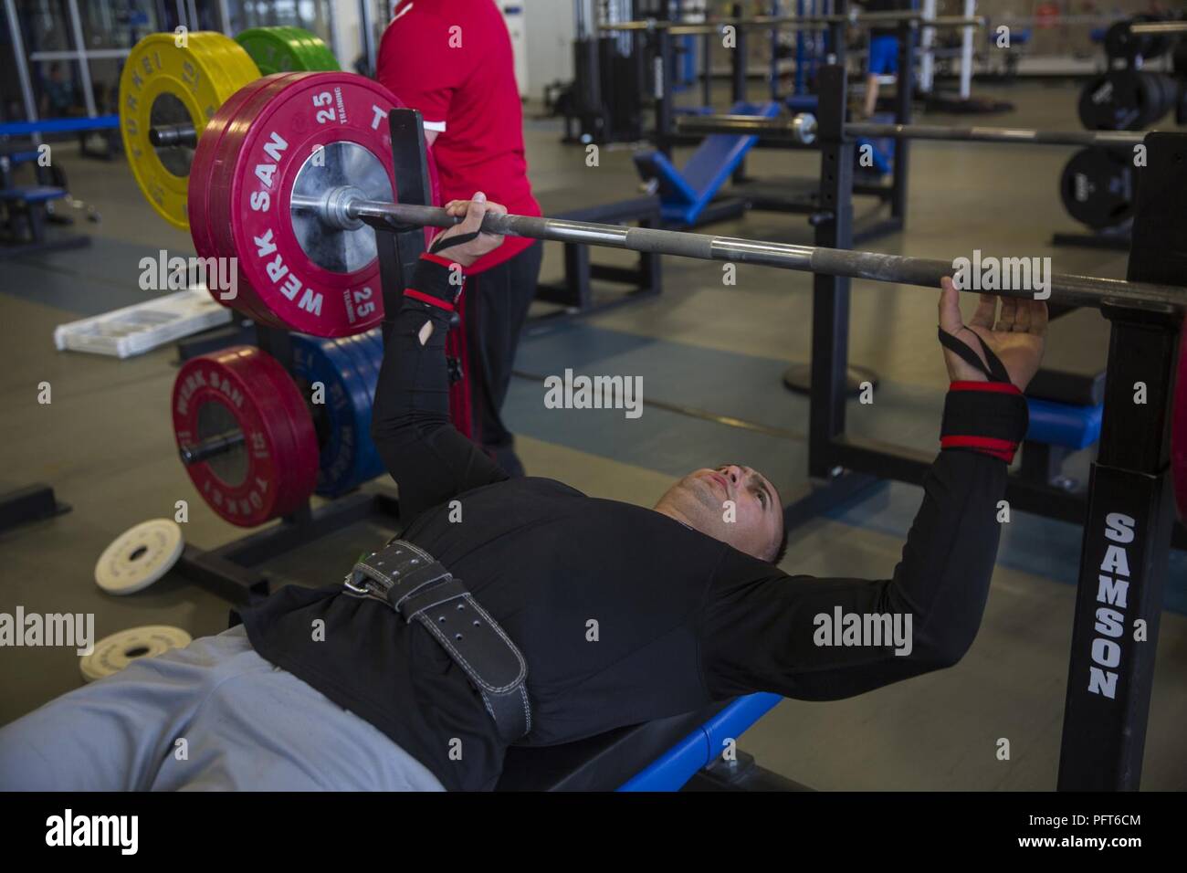 U.S. Marine Corps Staff Sgt. Robert Dominguez prepares to bench press during a 2018 DoD Warrior Games powerlifting practice at the Air Force Academy in Colorado Springs Colo. May 28 2018. The Warrior