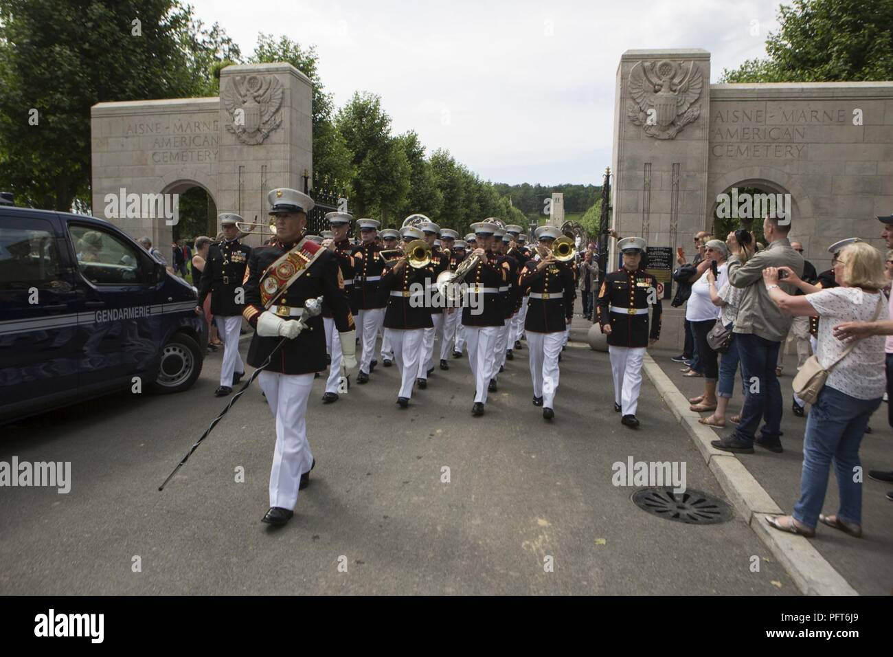 U.S. Marines with the 2d Marine Division Band, 2d MARDIV, march down to