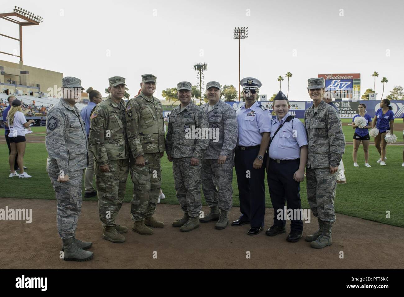 Active duty, guard and auxiliary members of the U.S. Armed Forces pose for  a photograph on the infield of Cashman Field during Military Appreciation  Night Stock Photo - Alamy