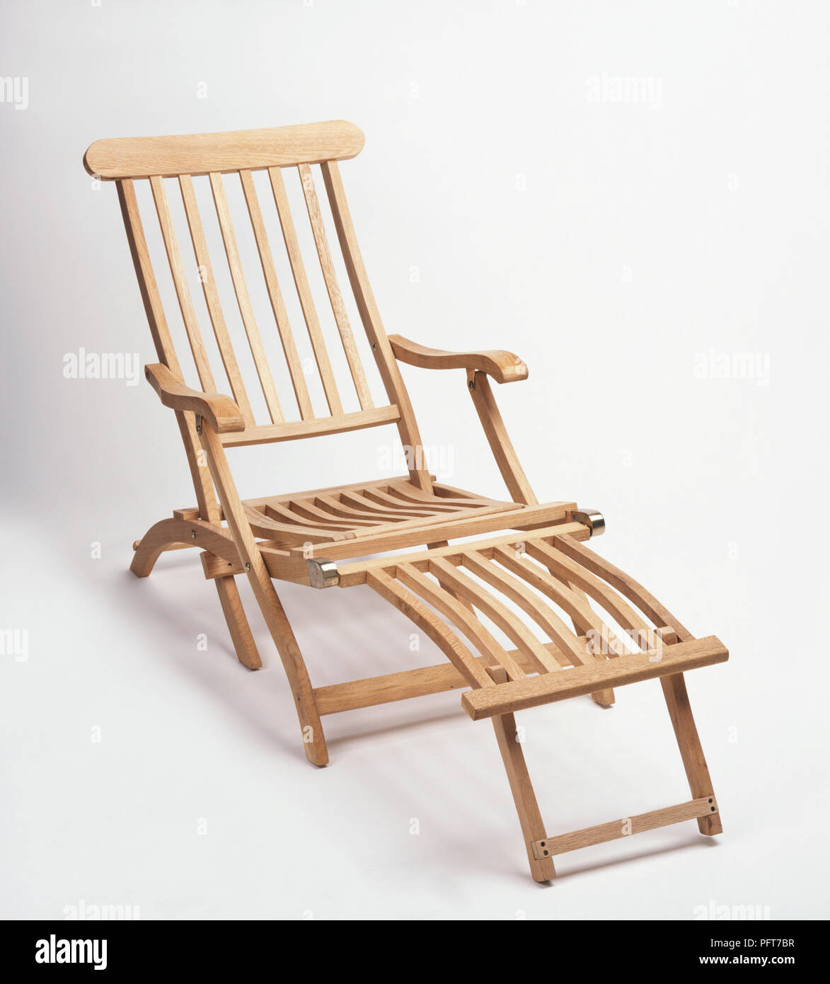 A wooden deck chair Stock Photo Alamy