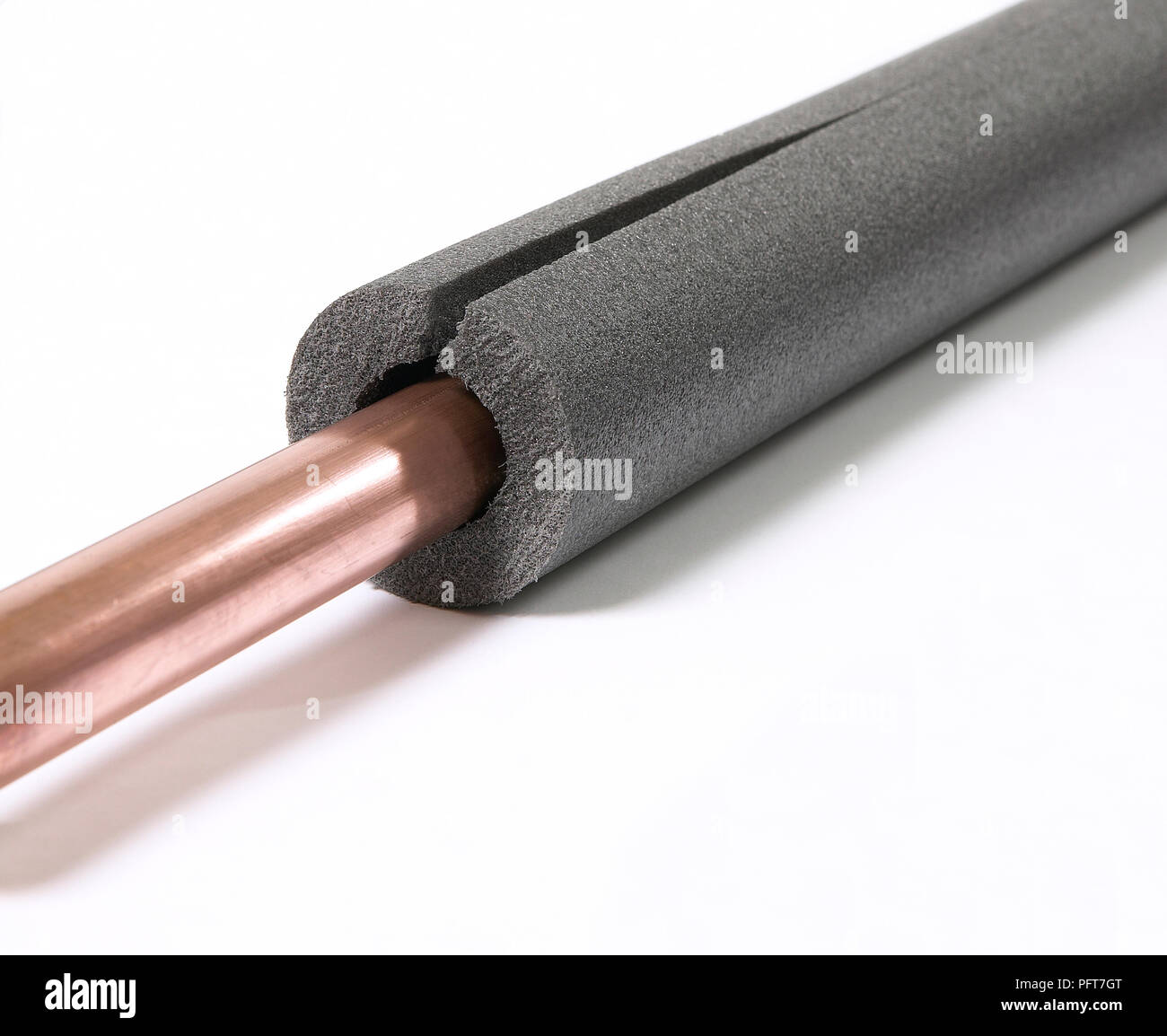 Pipe insulation around a copper pipe Stock Photo Alamy