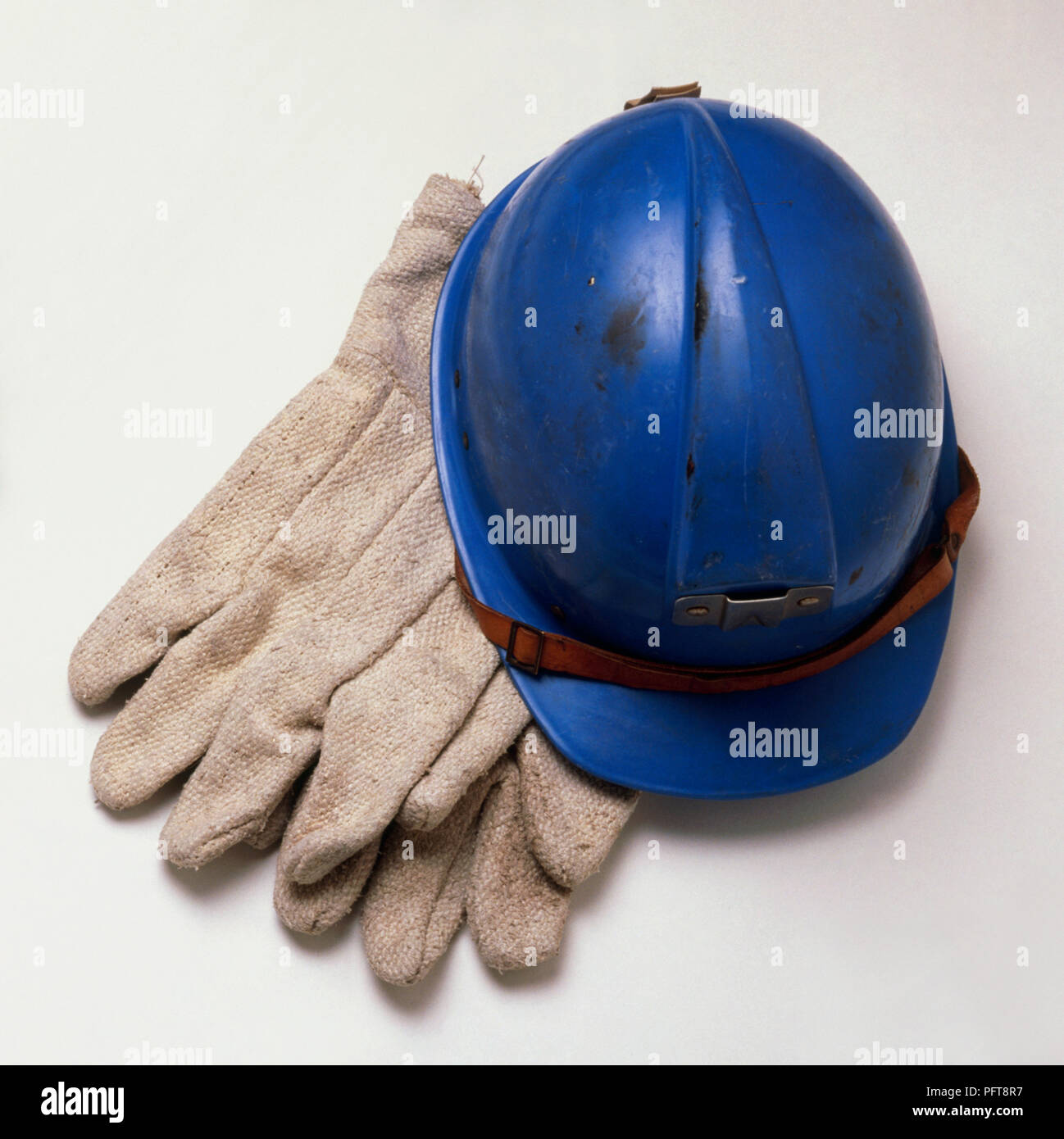 Safety helmet and gloves Stock Photo Alamy