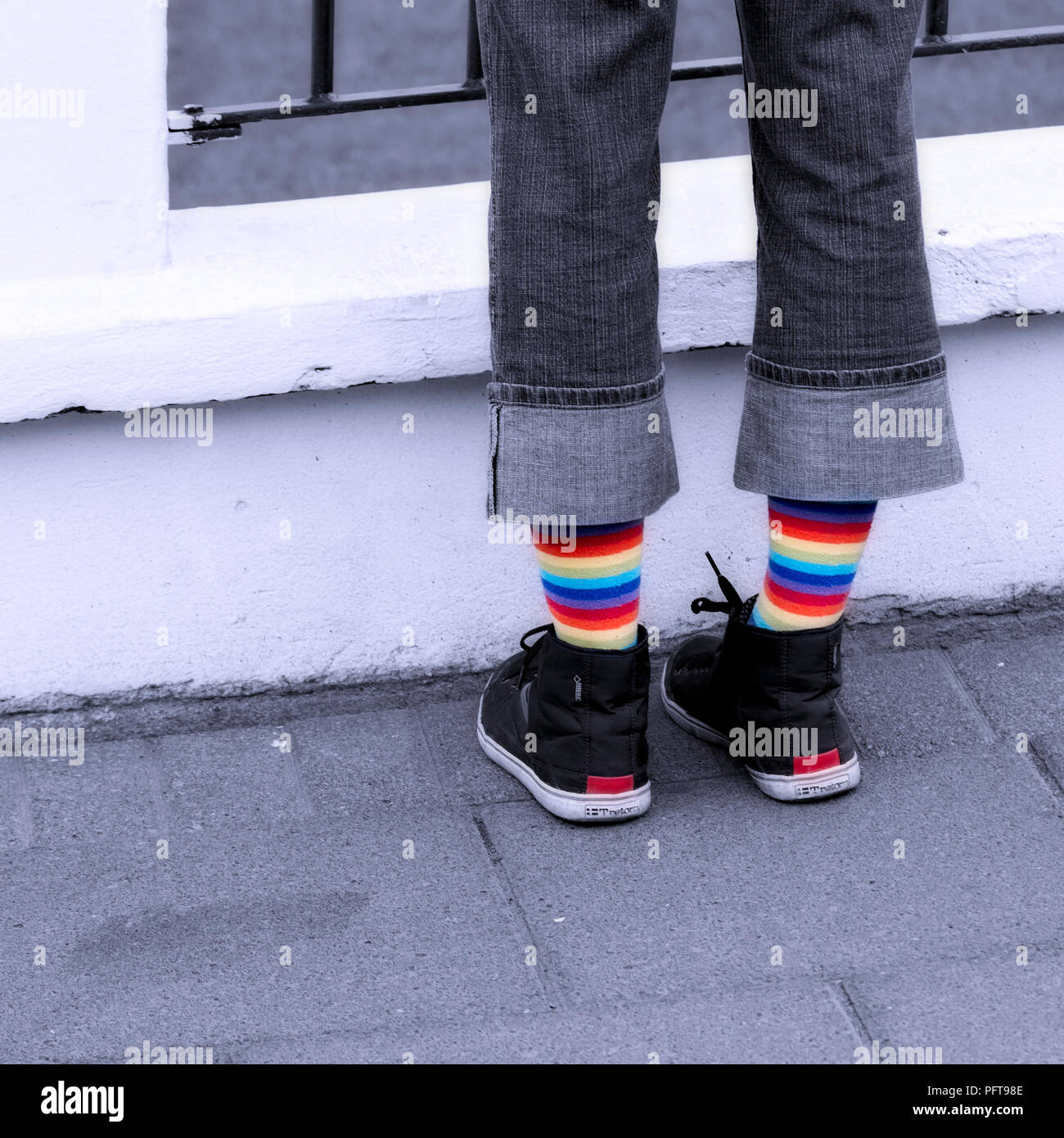 Legs with colourful socks in Reykjavik, Iceland Stock Photo