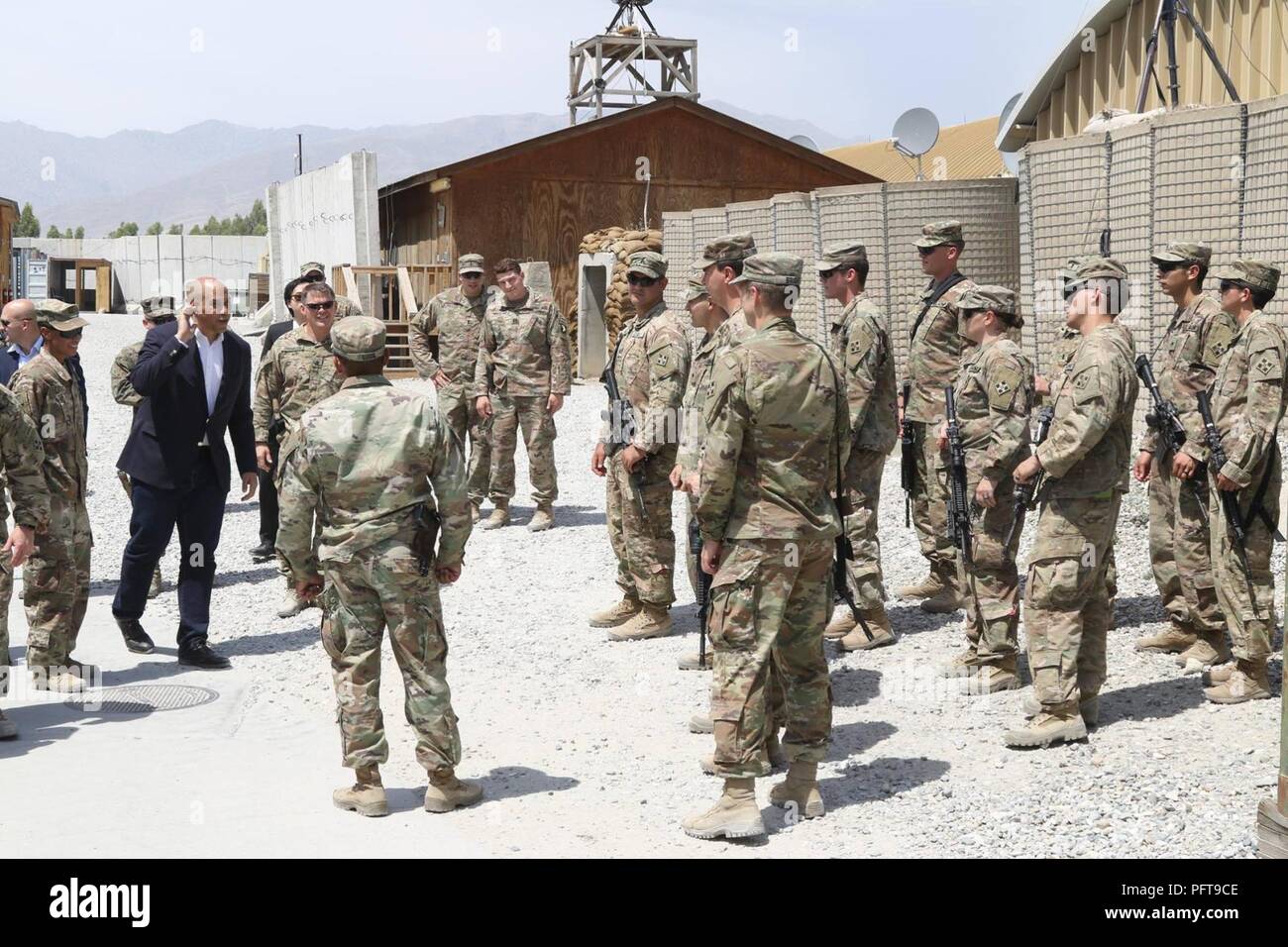 Senator Cory Booker visits 1st Stryker Brigade Combat Team, 4th Infantry Division assigned to Train Advise Assist Command - East in Afghanistan on May 26, 2018. Sen. Booker interacted with Soldiers while touring the base and received an operational and intelligence brief from the senior staff. As the Senator from New Jersey departed, TAAC-E command team and Soldiers expressed their gratitude for his visit and Sen. Booker said, 'Thank you, I am grateful for your service.' Stock Photo