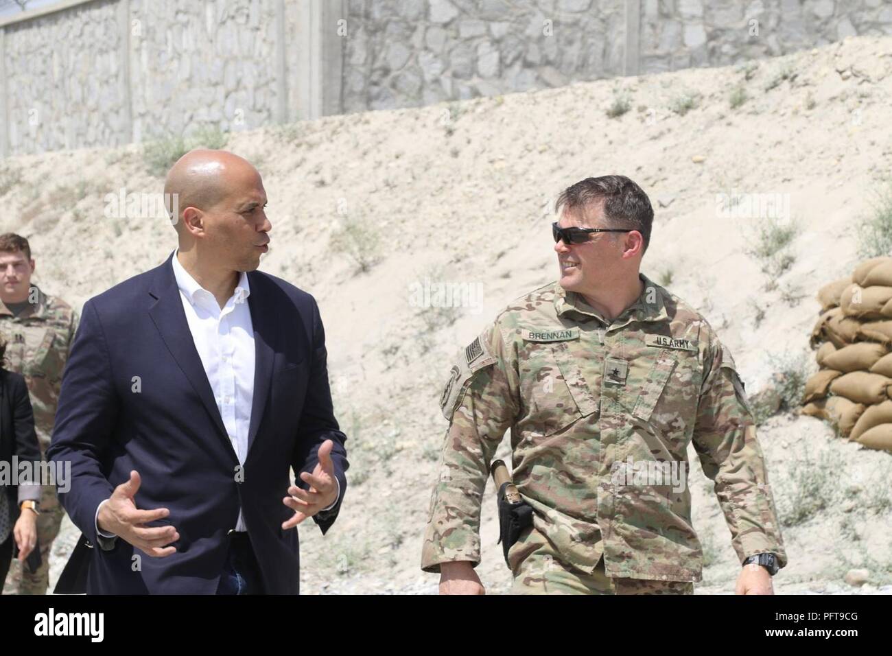 Senator Cory Booker visits 1st Stryker Brigade Combat Team, 4th Infantry Division assigned to Train Advise Assist Command - East in Afghanistan on May 26, 2018. Sen. Booker interacted with Soldiers while touring the base and received an operational and intelligence brief from the senior staff. As the Senator from New Jersey departed, TAAC-E command team and Soldiers expressed their gratitude for his visit and Sen. Booker said, 'Thank you, I am grateful for your service.' Stock Photo
