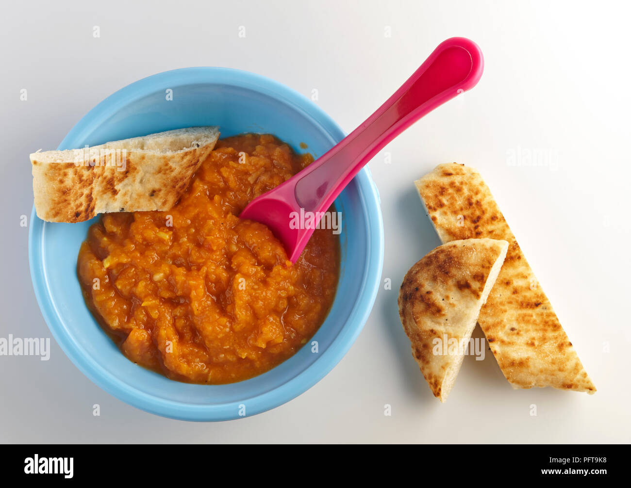 Vegetable curry with bread, baby food Stock Photo Alamy