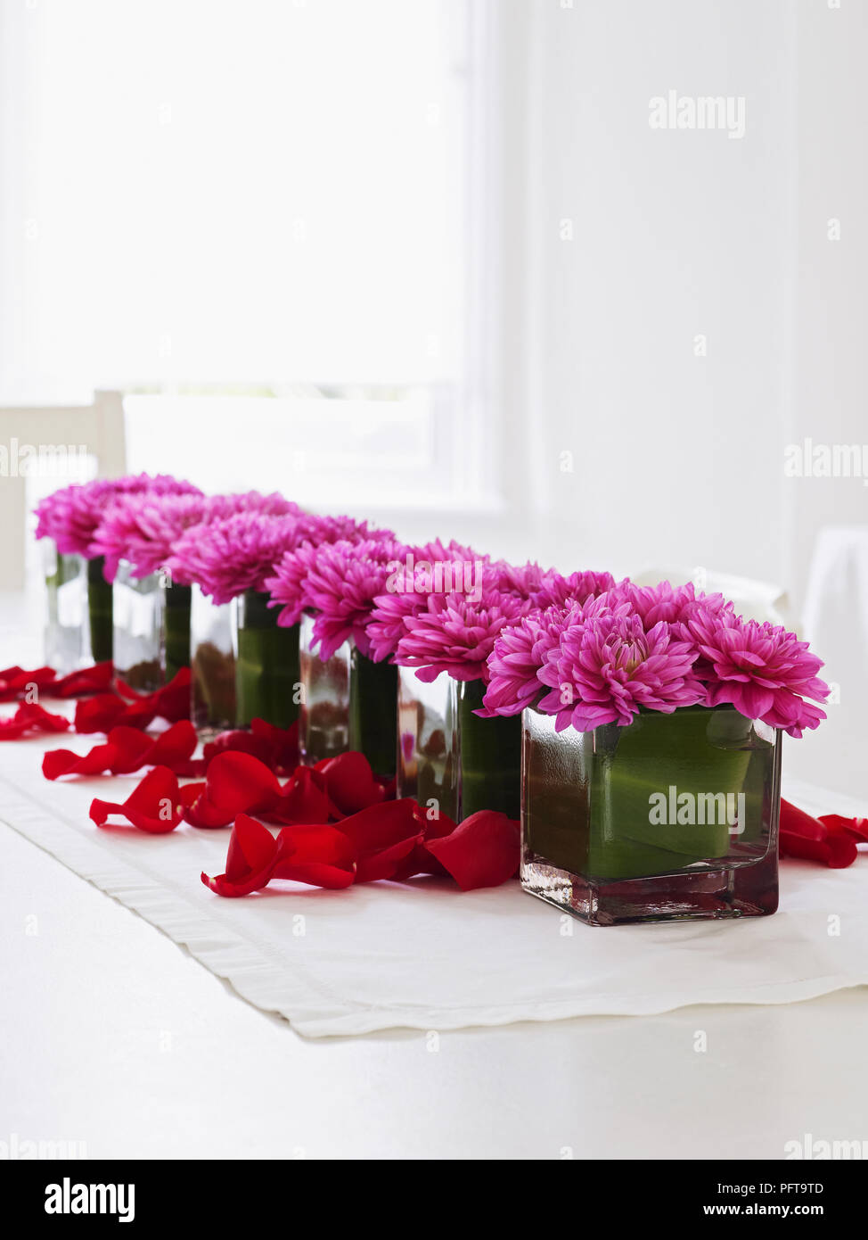Dahlias And Rose Petals Table Decoration Stock Photo