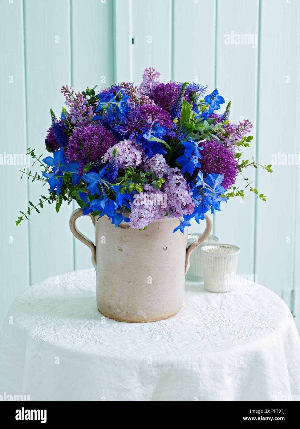 Purple and blue bouquet, lilac, centaurea, allium, delphinium, veronica, Eucalyptus parvifolia Stock Photo