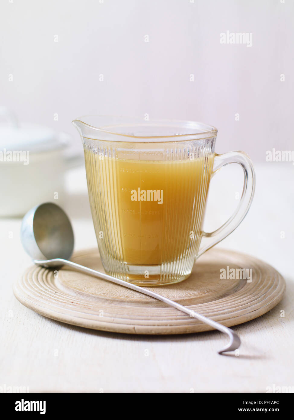 Chicken Stock in Clear Glass Jug Stock Photo by ©TravellingLight 203503932