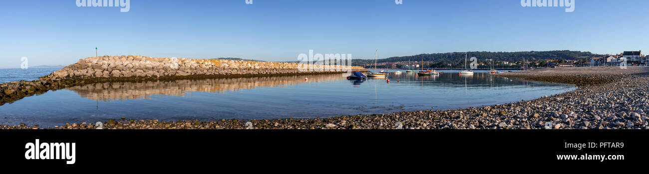Small boats in Rhos-on-Sea harbour on the North Wales coast Stock Photo