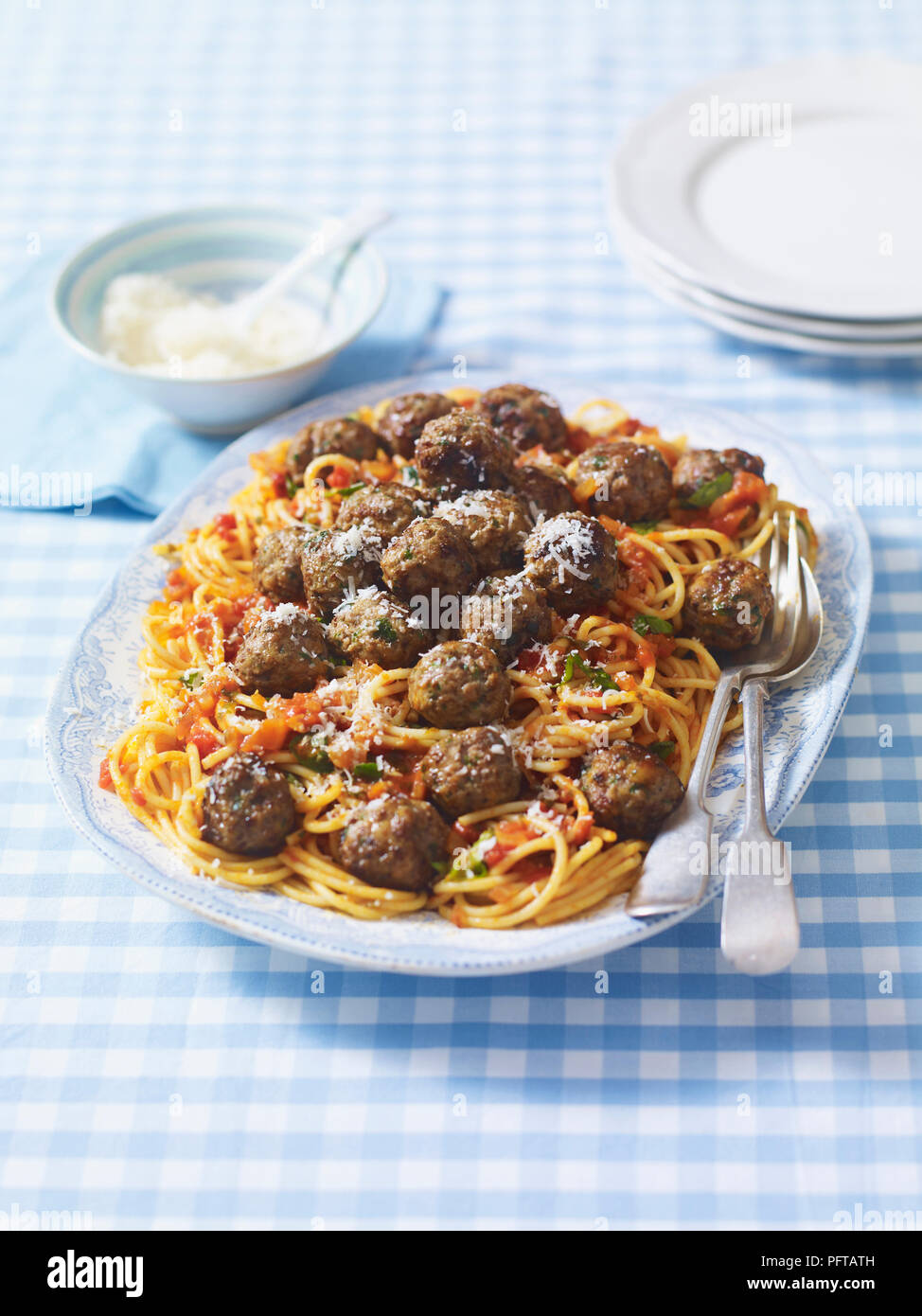 Spaghetti with meatballs and grated cheese Stock Photo