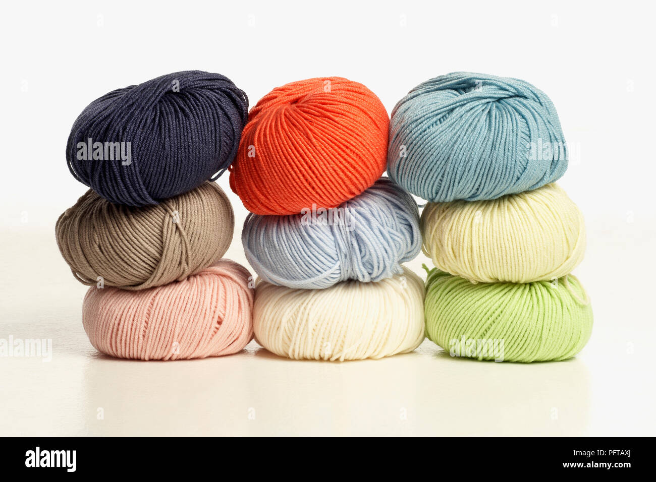 Stacks of coloured wool Stock Photo