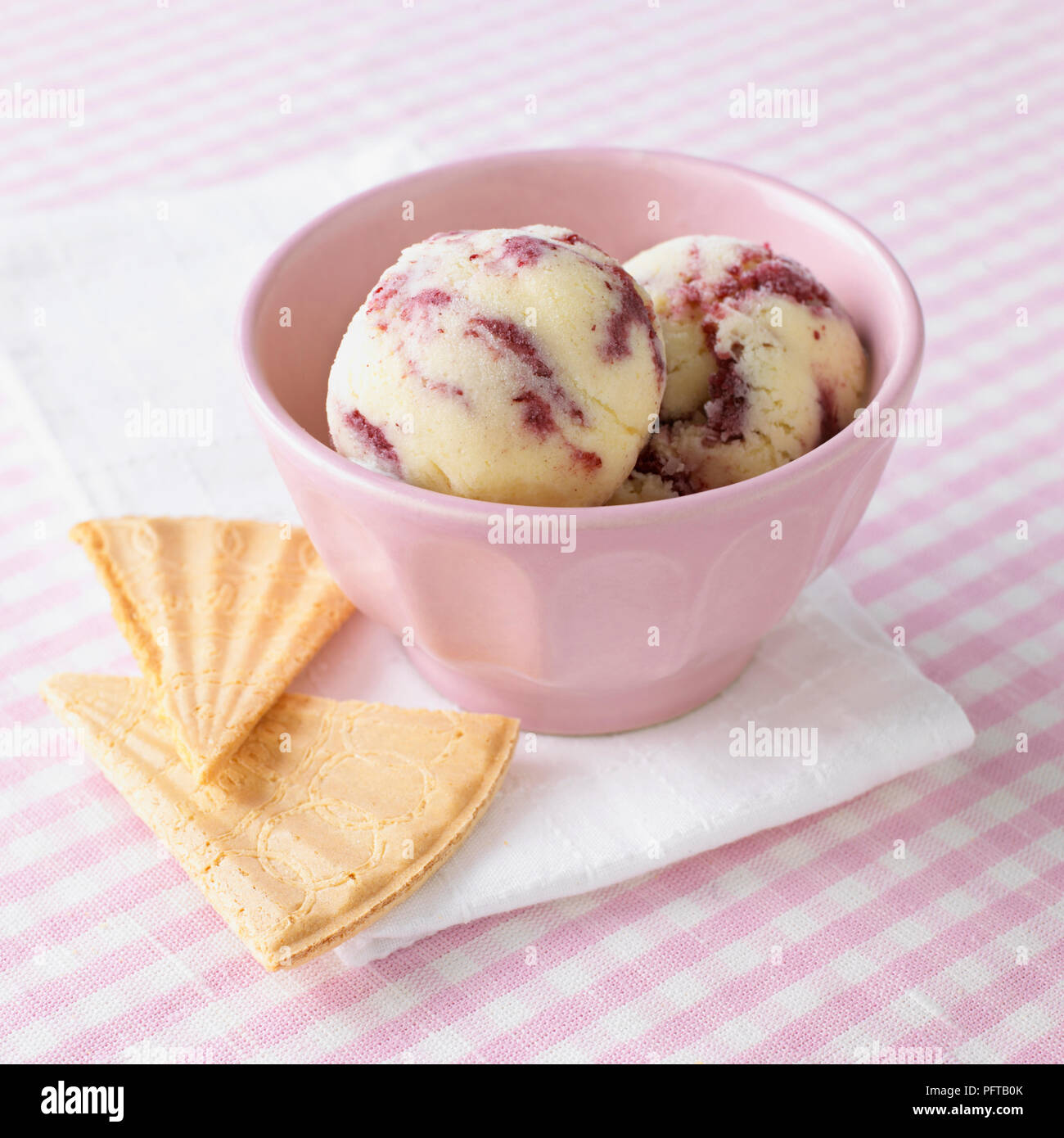 Blueberry ripple ice cream and wafers Stock Photo